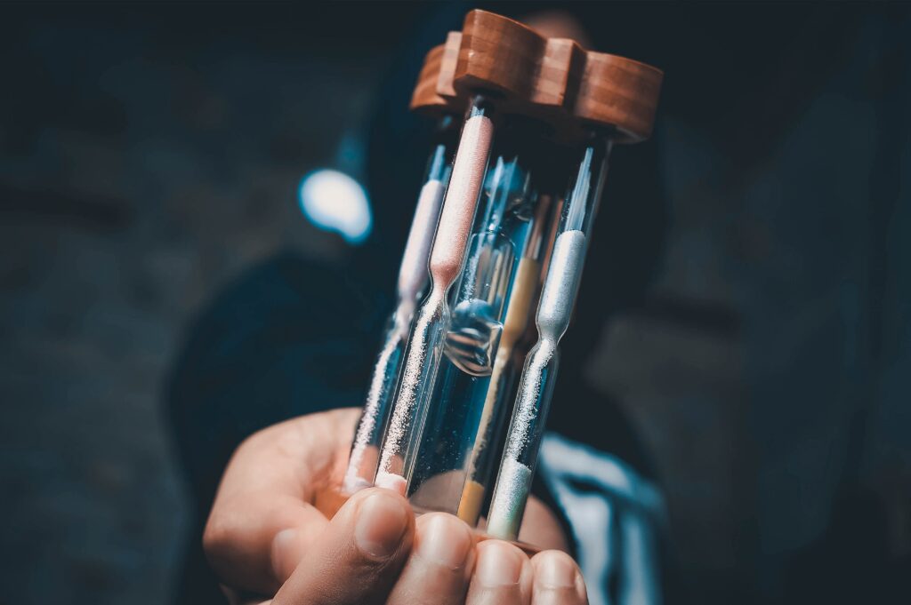 hourglass in someone's hand